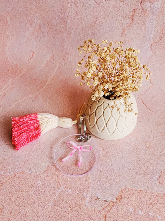 Pink croquette bow acrylic keychain